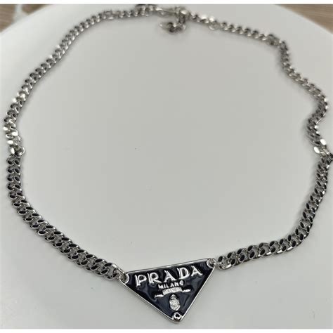 prada black triangle necklace